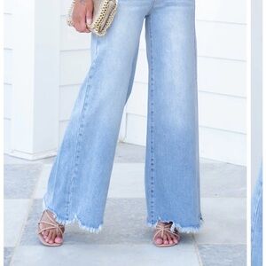 Risen High Rise Light Wash Wide Leg Jeans